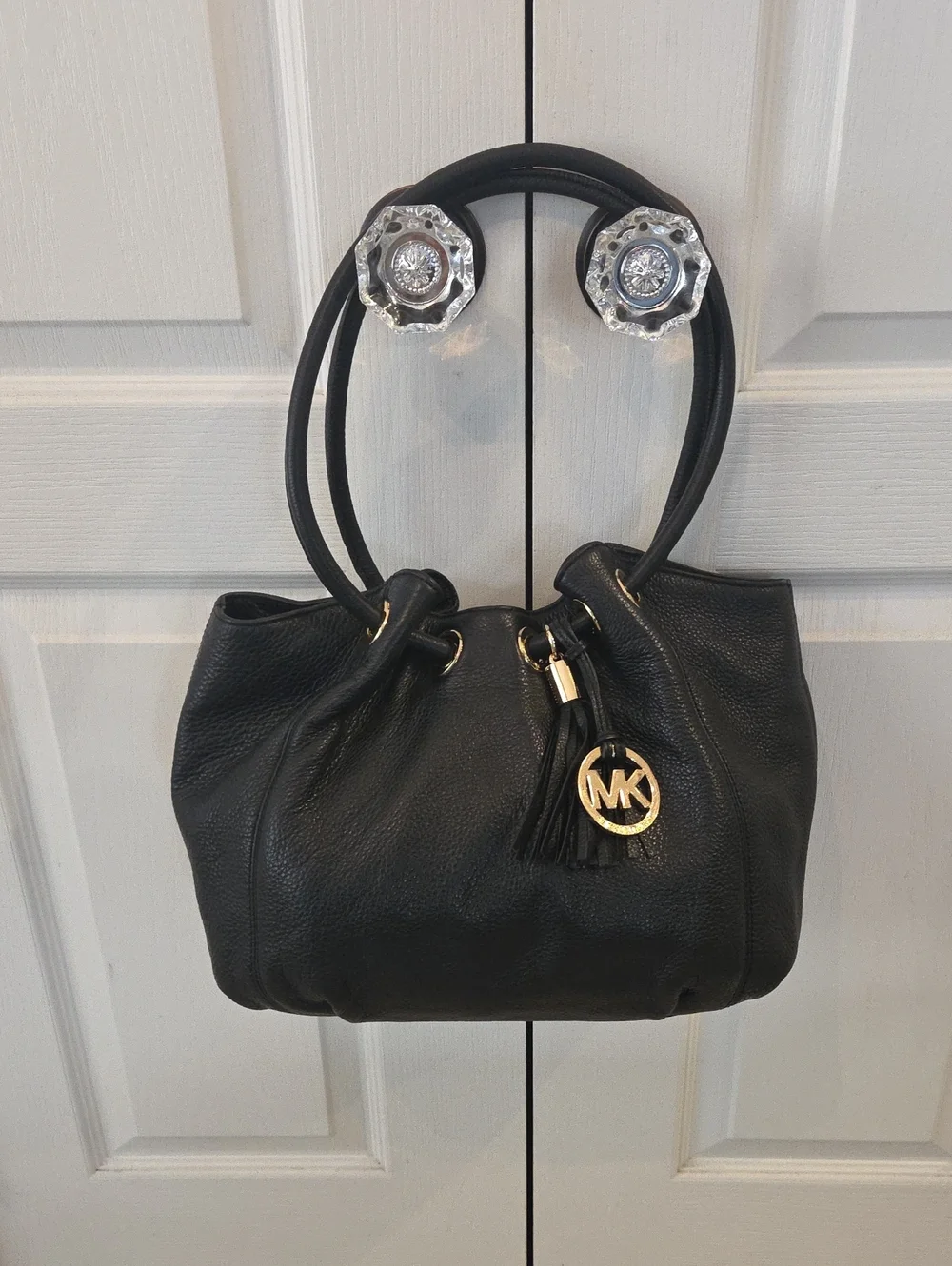 EUC Michael Kors Black Pebbled Leather Tote with Gold Hardware And Tassel